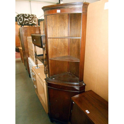 419 - A mahogany finish corner cupboard (no key) height 182.5cm, width at widest 65cm, depth 40.5cm approx... 