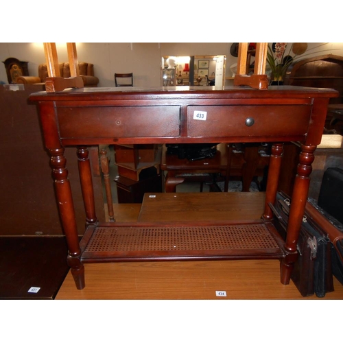 433 - A darkwood stained wall/hall table with drawer and bergere to base, missing 1 knob, height 75cm, wid... 