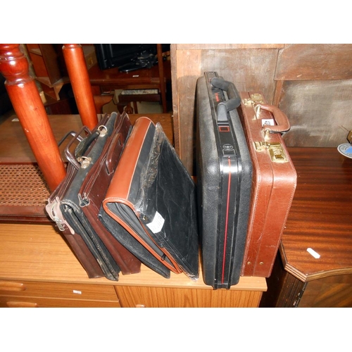 435 - A quantity of  briefcases/attache/document cases etc,