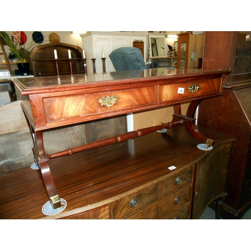 436 - A mahogany sofa table with brass fittings, height 47cm, width 102cm approx.