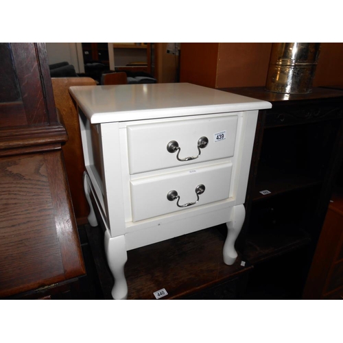 439 - A white finished 2 drawer bedside chest of drawers, height 56cm, width 45.5cm approx.