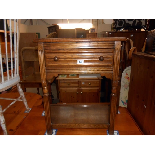 448 - A medium oak wall table with drawer and under shelf, height 72cm, width at widest 80cm approx.