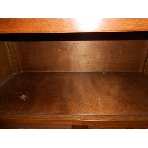 458 - A carved oak 2 drawer 2 cupboard small buffet, height 80cm, width 84cm approx.