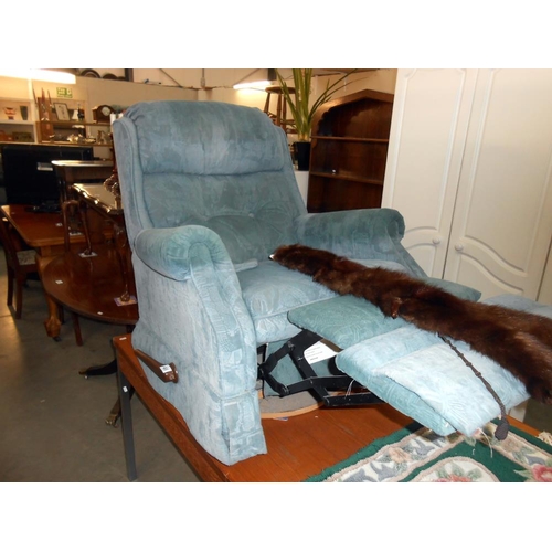 468 - A green/blue fabric manual recliner arm chair