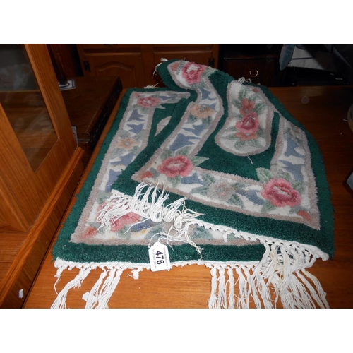 476 - 2 green floral small rugs/door mats, size 74cm x 42cm approx.