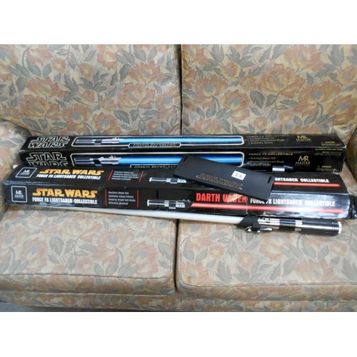 510 - 2 Star wars light sabers (Anakin and Darth Vader) stand with Darth Vader but no brackets, no stand w... 