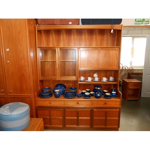 519 - A teak effect wall unit (drinks cabinet locked, no key) Height 194cm, width 153cm