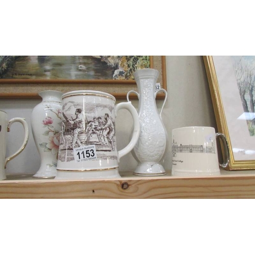 1153 - A mixed lot of tankards and vases etc., including The Ashes Tankard 1882 - 1992 and Royal Navy Colle... 