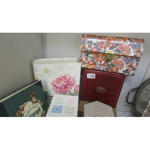 1154 - A mixed lot of pretty boxes and photograph albums including notelet boxes, letter file etc.,