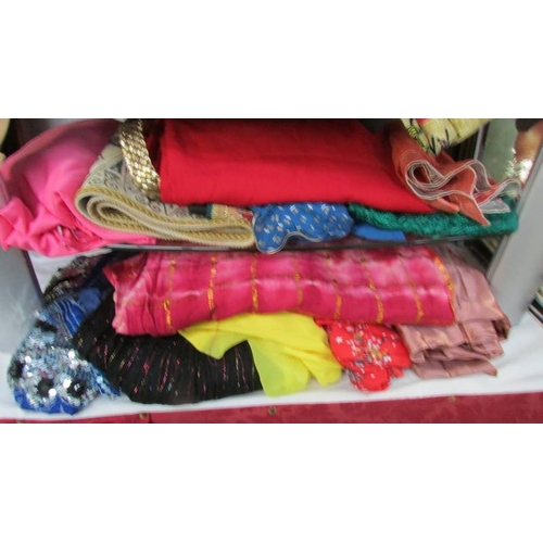 1161 - A good lot of Sari's, Egyptian themed clothing including dresses, scarves etc.,