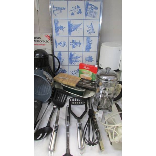 1166 - A good mixed lot of kitchen ware including new utensils, baking tray, vintage Moulinex mixer, hand b... 