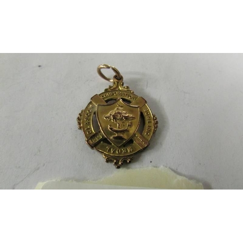 2118 - A Glasgow Corporation Bowling Medal dated 1908, (ring marked 9ct, medal not marked but possibly gold... 