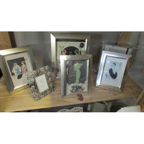 1202 - Approximately 25 assorted photo frames (4 with art deco style prints) and including 2 framed and gla... 