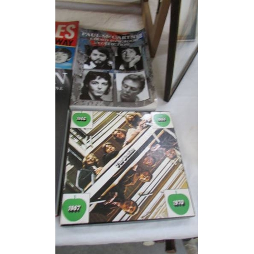 1226 - A mixed lot of Beatles memorabilia including a rare 4 cassette boxed set, a (Spanish) song book of J... 