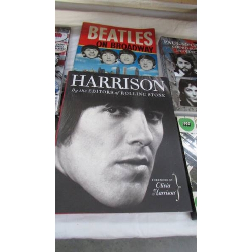 1226 - A mixed lot of Beatles memorabilia including a rare 4 cassette boxed set, a (Spanish) song book of J... 