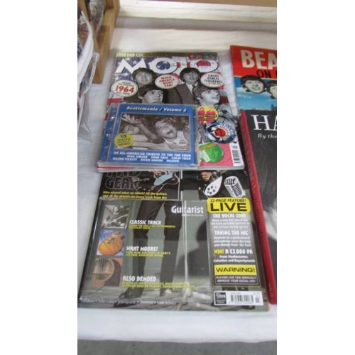 1226 - A mixed lot of Beatles memorabilia including a rare 4 cassette boxed set, a (Spanish) song book of J... 