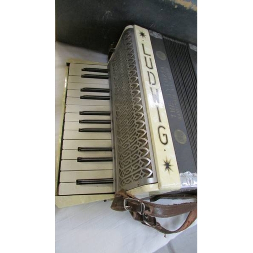 1228 - A cased Ludwig 'The Antoria' accordion.