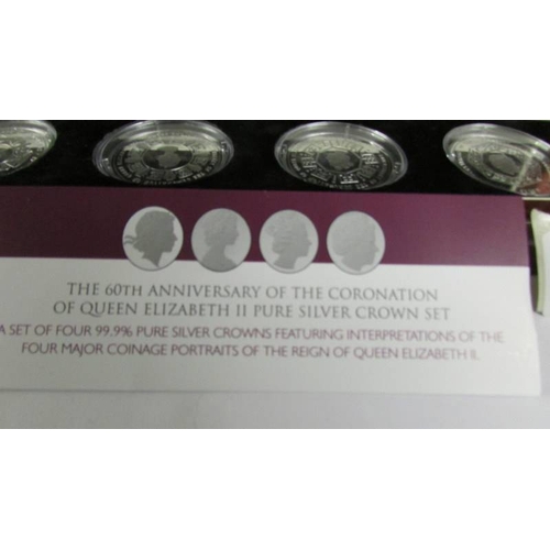 2134 - A cased set of four 60th anniversary of the coronation of Queen Elizabeth II silver coins featuring ... 