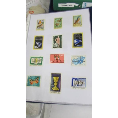 2139 - Ten albums of stamps including Poland, Szechoslovakia, Singapore, Malasia etc.,