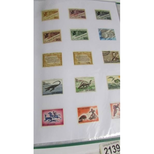 2139 - Ten albums of stamps including Poland, Szechoslovakia, Singapore, Malasia etc.,