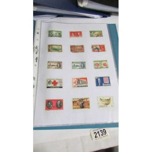 2139 - Ten albums of stamps including Poland, Szechoslovakia, Singapore, Malasia etc.,