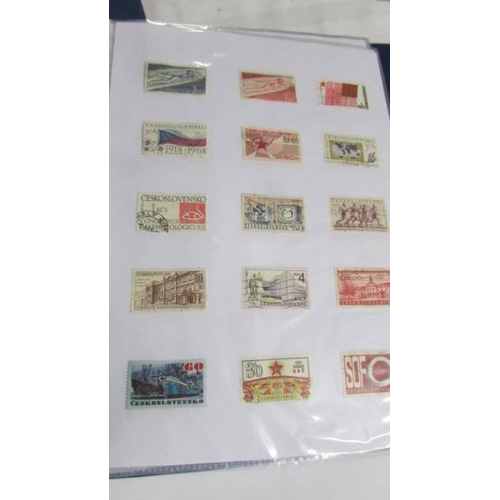 2139 - Ten albums of stamps including Poland, Szechoslovakia, Singapore, Malasia etc.,