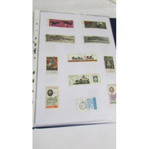 2139 - Ten albums of stamps including Poland, Szechoslovakia, Singapore, Malasia etc.,