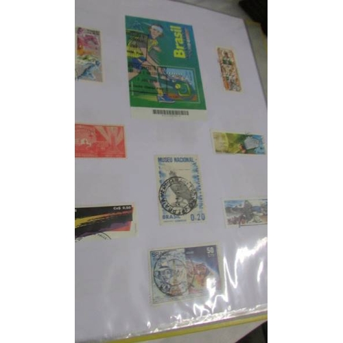 2139 - Ten albums of stamps including Poland, Szechoslovakia, Singapore, Malasia etc.,