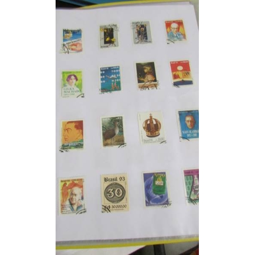 2139 - Ten albums of stamps including Poland, Szechoslovakia, Singapore, Malasia etc.,