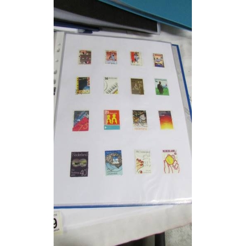 2139 - Ten albums of stamps including Poland, Szechoslovakia, Singapore, Malasia etc.,