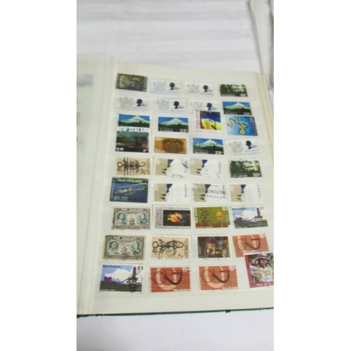 2140 - Five large stock books of stamps including Canada, Commonwealth, Australia etc.,