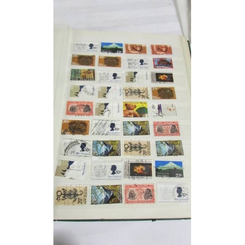 2140 - Five large stock books of stamps including Canada, Commonwealth, Australia etc.,