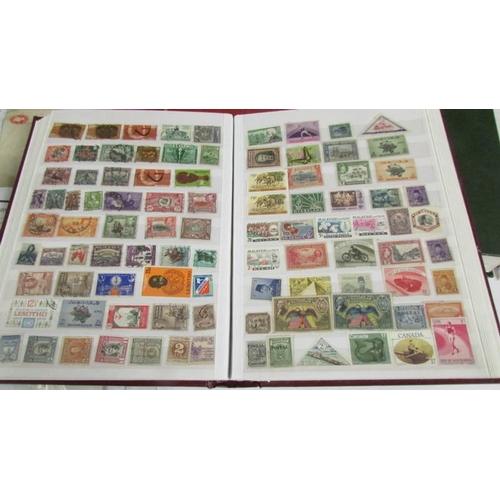 2140 - Five large stock books of stamps including Canada, Commonwealth, Australia etc.,