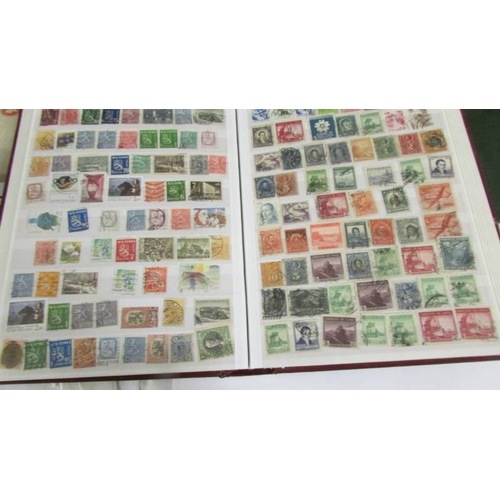 2140 - Five large stock books of stamps including Canada, Commonwealth, Australia etc.,