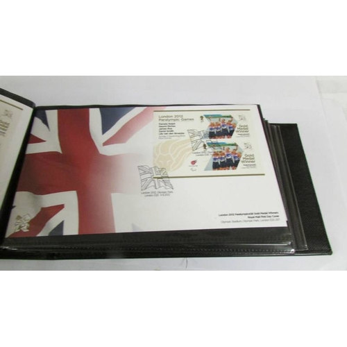 2142 - An Olympic Paralympic Games 2012 album of first day covers and a quantity of 2000 - 2001 first day c... 