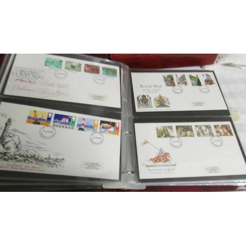 2145 - A quantity of first day covers in 4 albums.