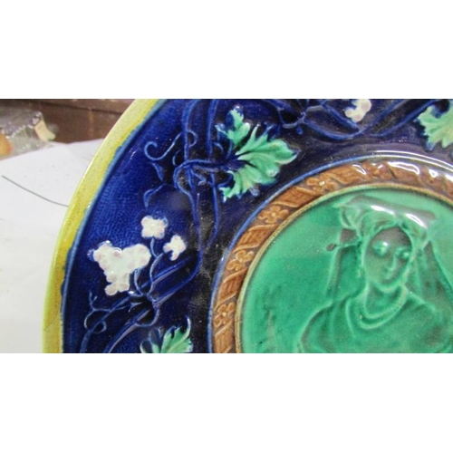 2150 - A 19th century or earlier majolica portrait plate.