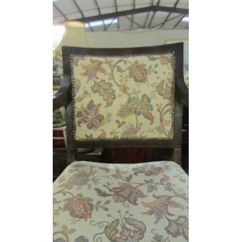 1295 - A 19th century hall chair with new upholstery