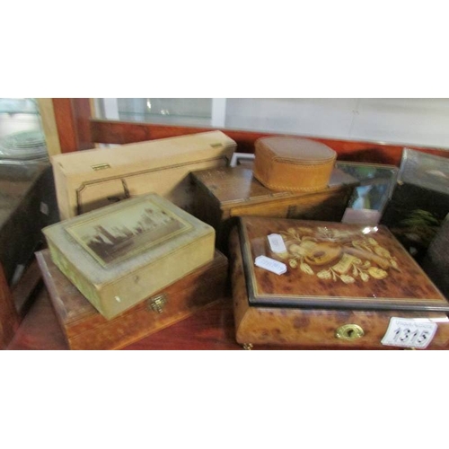 1315 - A selection of old boxes including inlaid, musical etc.,