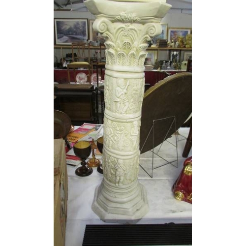 1333 - A cream pottery table lamp with shade on a plaster pillar, lamp needs rewiring, (pillar 64.5 cm and ... 