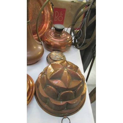 1341 - A mixed lot of copper ware including jelly mould, tall jug, wall plaque etc.,