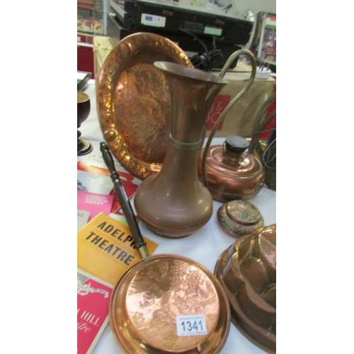 1341 - A mixed lot of copper ware including jelly mould, tall jug, wall plaque etc.,