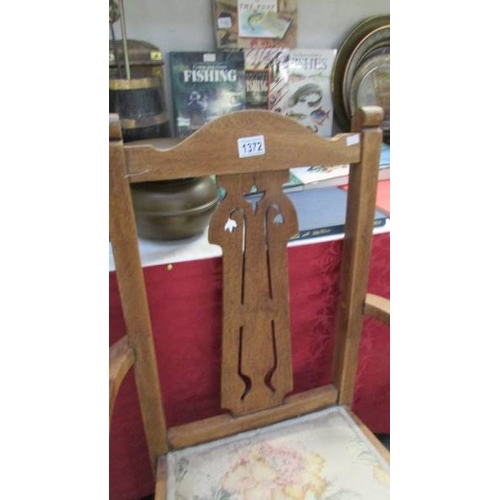 1372 - A 1930's oak carver chair.