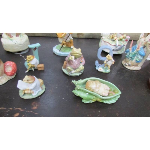 1400 - A collection of Beatrix Potter figures including musical including Border Fine Arts, Royal Albert an... 