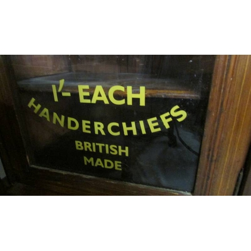 2197 - A sign written mahogany inlaid cabinet.