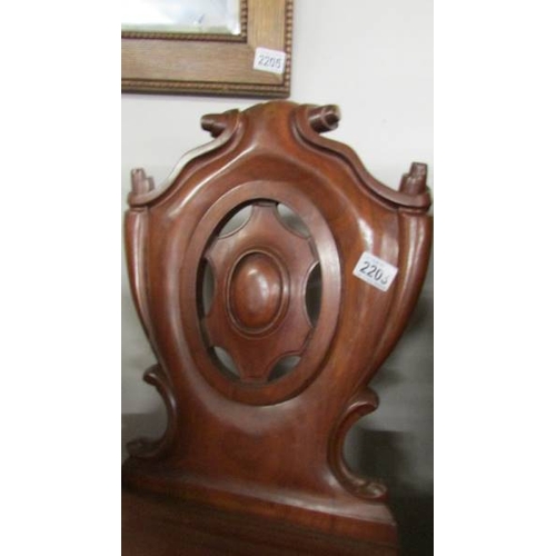 2203 - A mahogany hall chair.