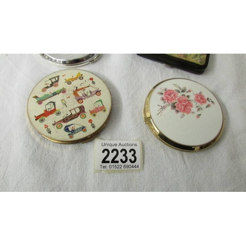 2233 - 2 vintage powder compacts, a souvenir cigarette box and one other box set coloured stones (one stone... 