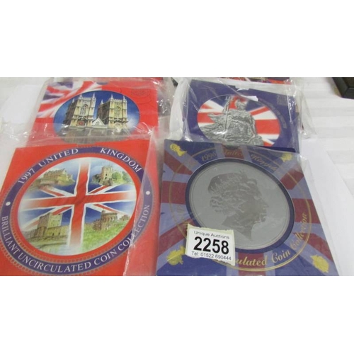 2258 - 12 Brilliant uncirculated coin packs, 1991, 1994, 1995, 1996, 1997 - 2000, 2001, 2002-2004.