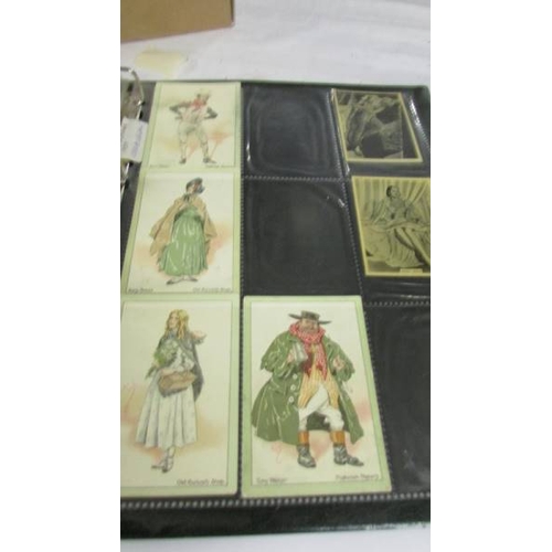 2261 - An album of cigarette cards including Players Dogs, Treasures of Britain, Famous Beauties, Senior Se... 