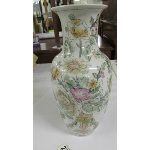 2268 - A Chinese vase with coloured prunus flowers, 32 cm tall.